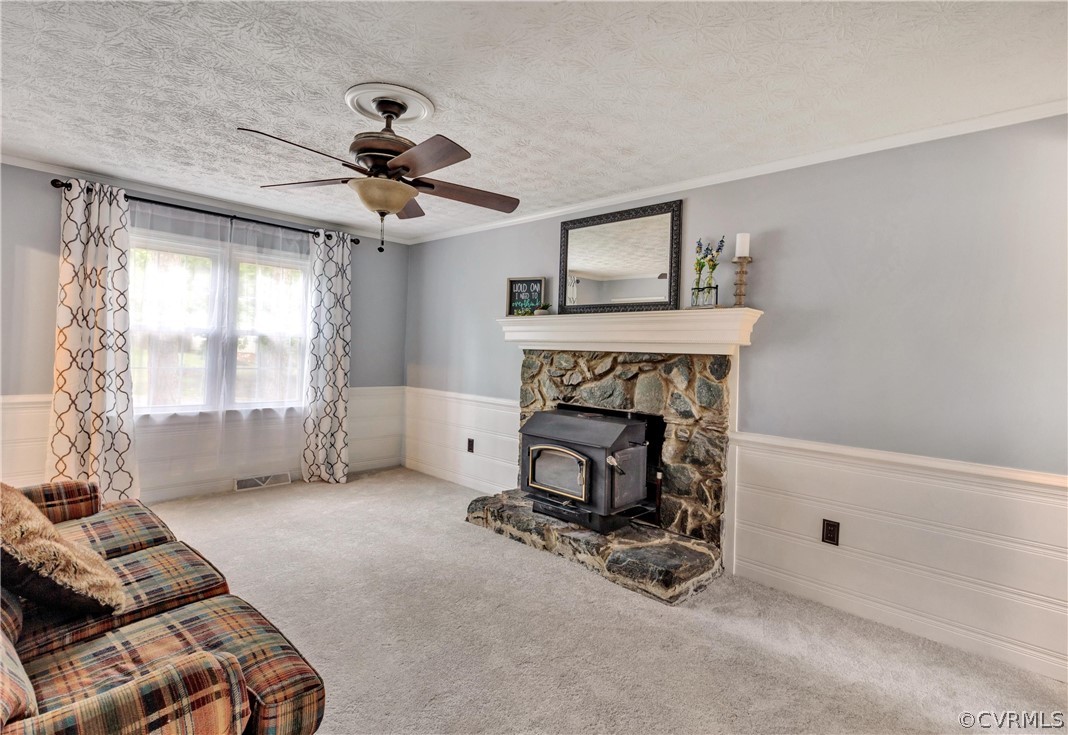 4801 Wilconna Road Chesterfield, VA 23832 - Photo 14 of 25 a living room with furniture and a fireplace