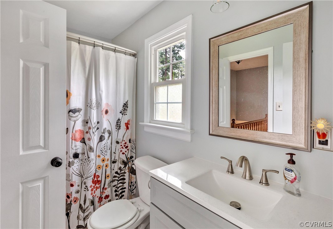 4801 Wilconna Road Chesterfield, VA 23832 - Photo 19 of 25 a bathroom with a sink toilet and shower
