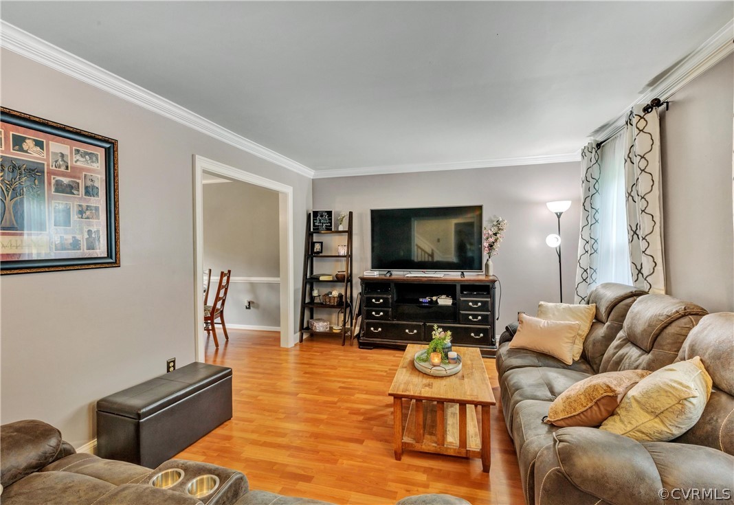 4801 Wilconna Road Chesterfield, VA 23832 - Photo 3 of 25 a living room with furniture and a flat screen tv