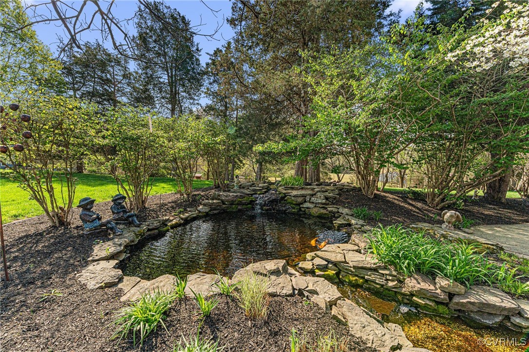 16287 Derby Ridge Road Montpelier, VA 23192 - Photo 13 of 50 View of yard with a small pond
