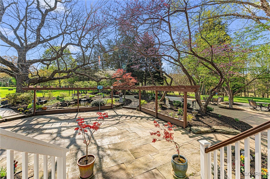 16287 Derby Ridge Road Montpelier, VA 23192 - Photo 19 of 50 View of patio with a garden