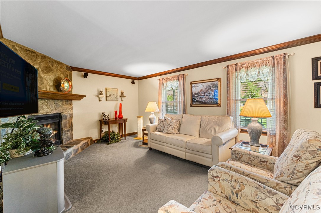 16287 Derby Ridge Road Montpelier, VA 23192 - Photo 27 of 50 Carpeted living room with crown molding, a firepla