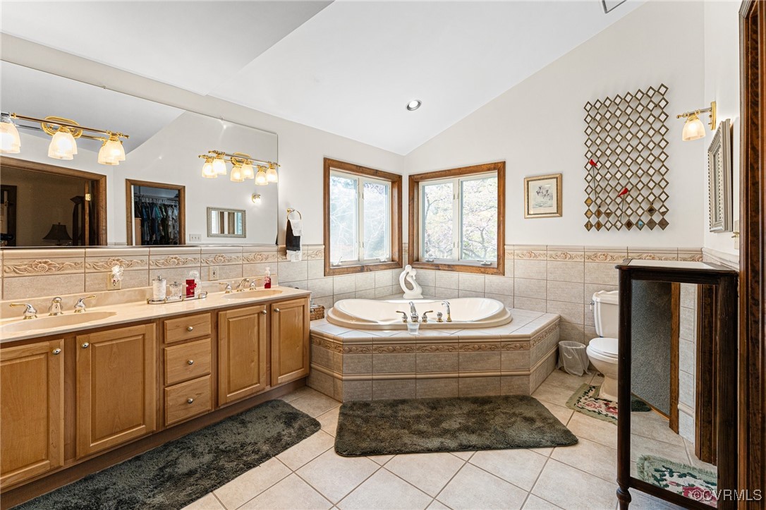 16287 Derby Ridge Road Montpelier, VA 23192 - Photo 43 of 50 Full bathroom featuring tile patterned floors, a b