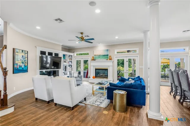 a kitchen with a sink cabinets and window