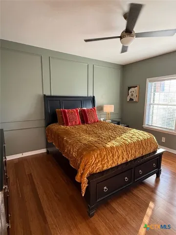 a view of a swimming pool with outdoor seating