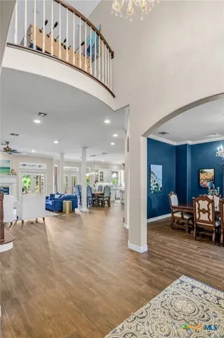 a view of a living room and dining room