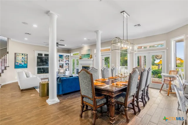 a kitchen with a table and chairs