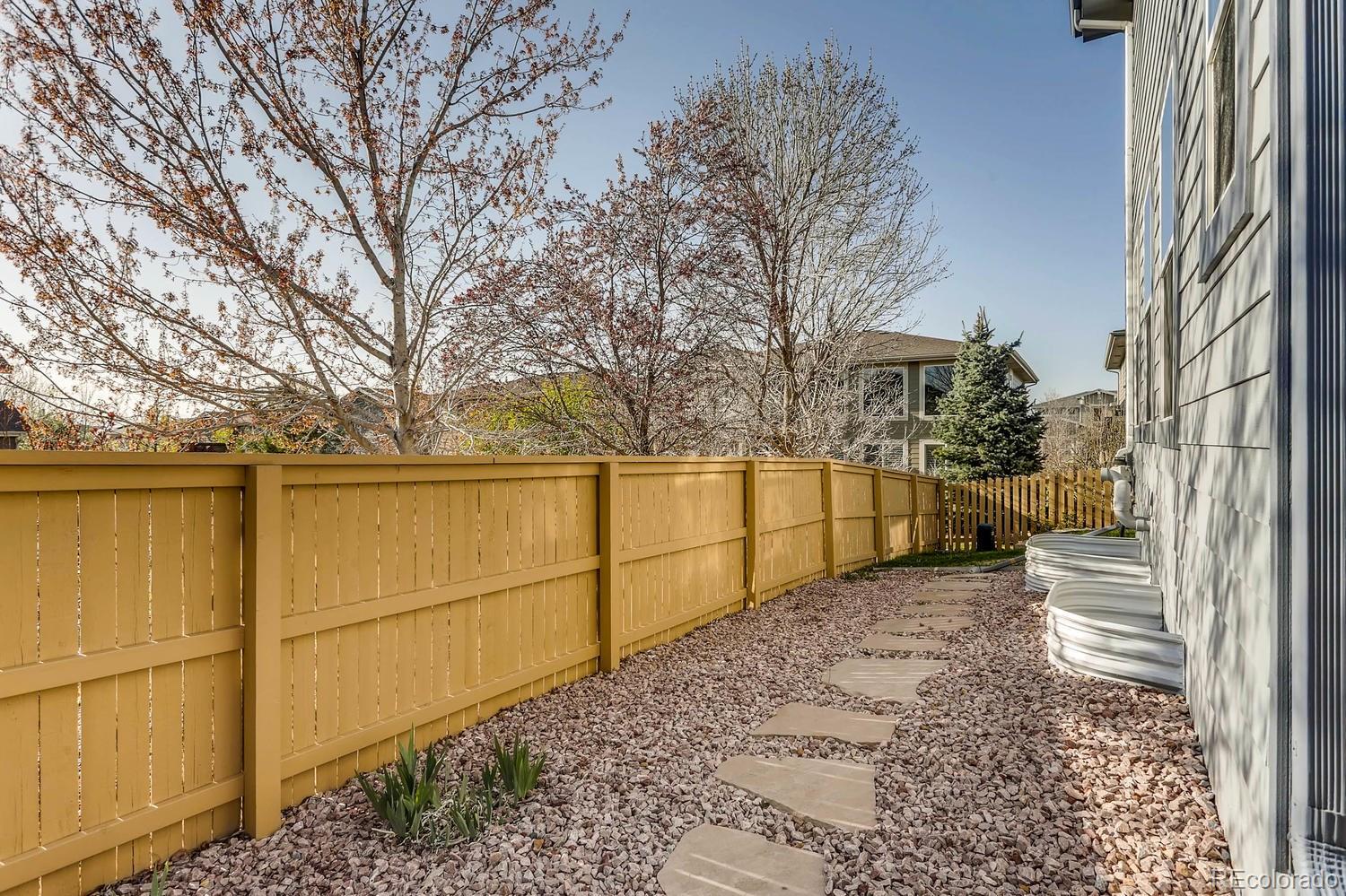 10825 Towerbridge Road Highlands Ranch, CO 80130 - Photo 23 of 24 a view of a backyard