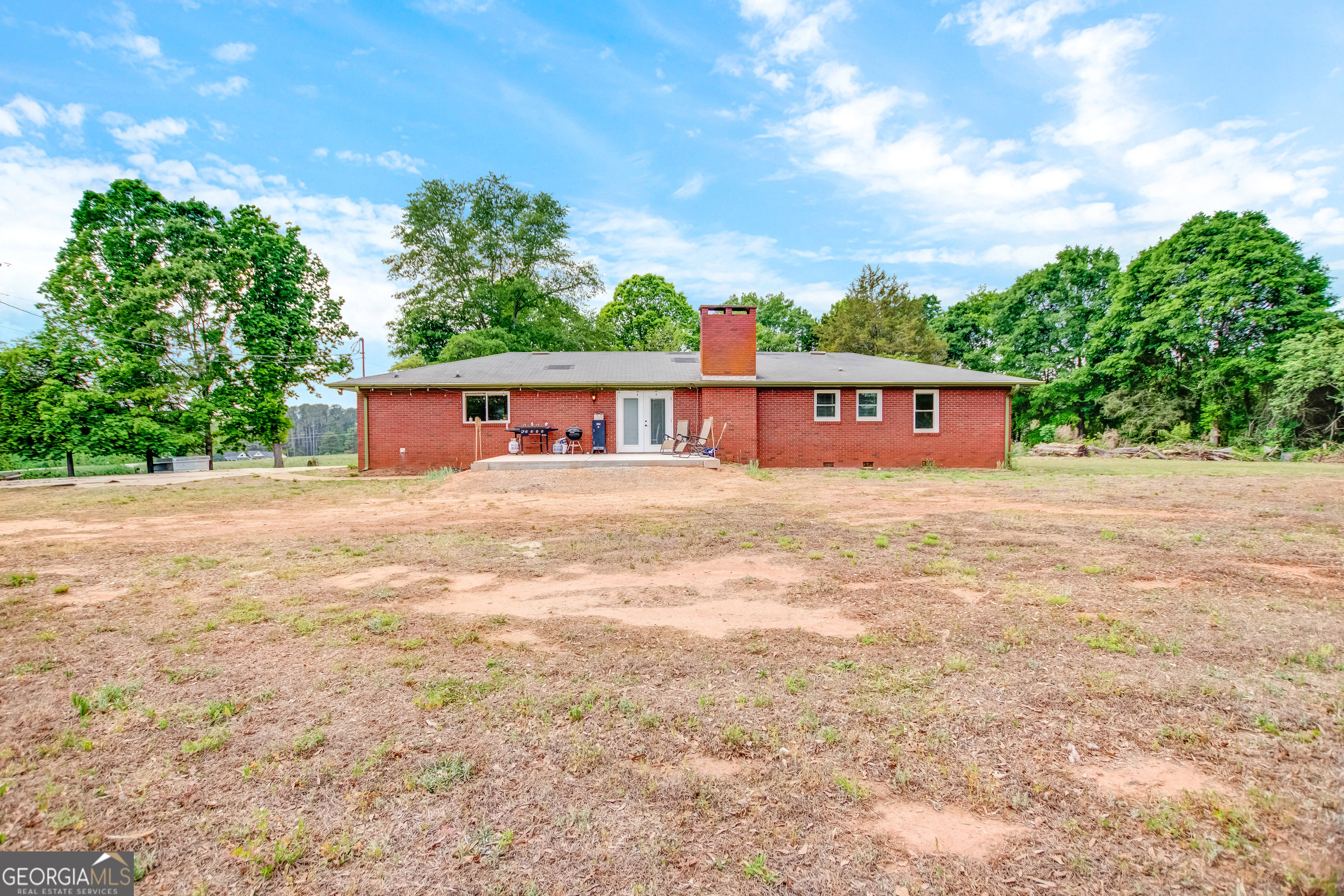 127 Akins Bridge Road Eastanollee, GA 30538 - Photo 12 of 52 a view of a house with yard and sitting area