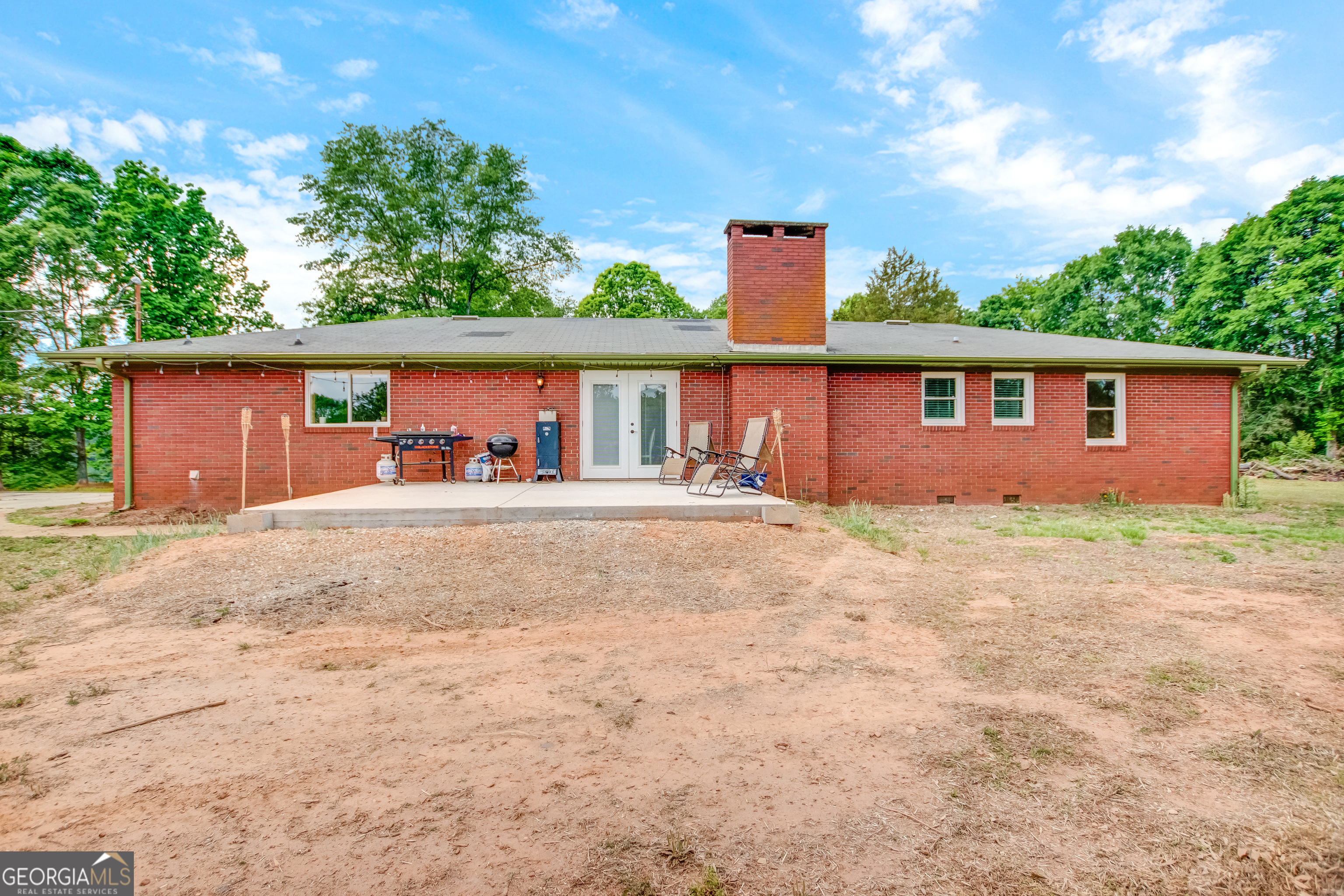 127 Akins Bridge Road Eastanollee, GA 30538 - Photo 13 of 52 front view of a house with a patio