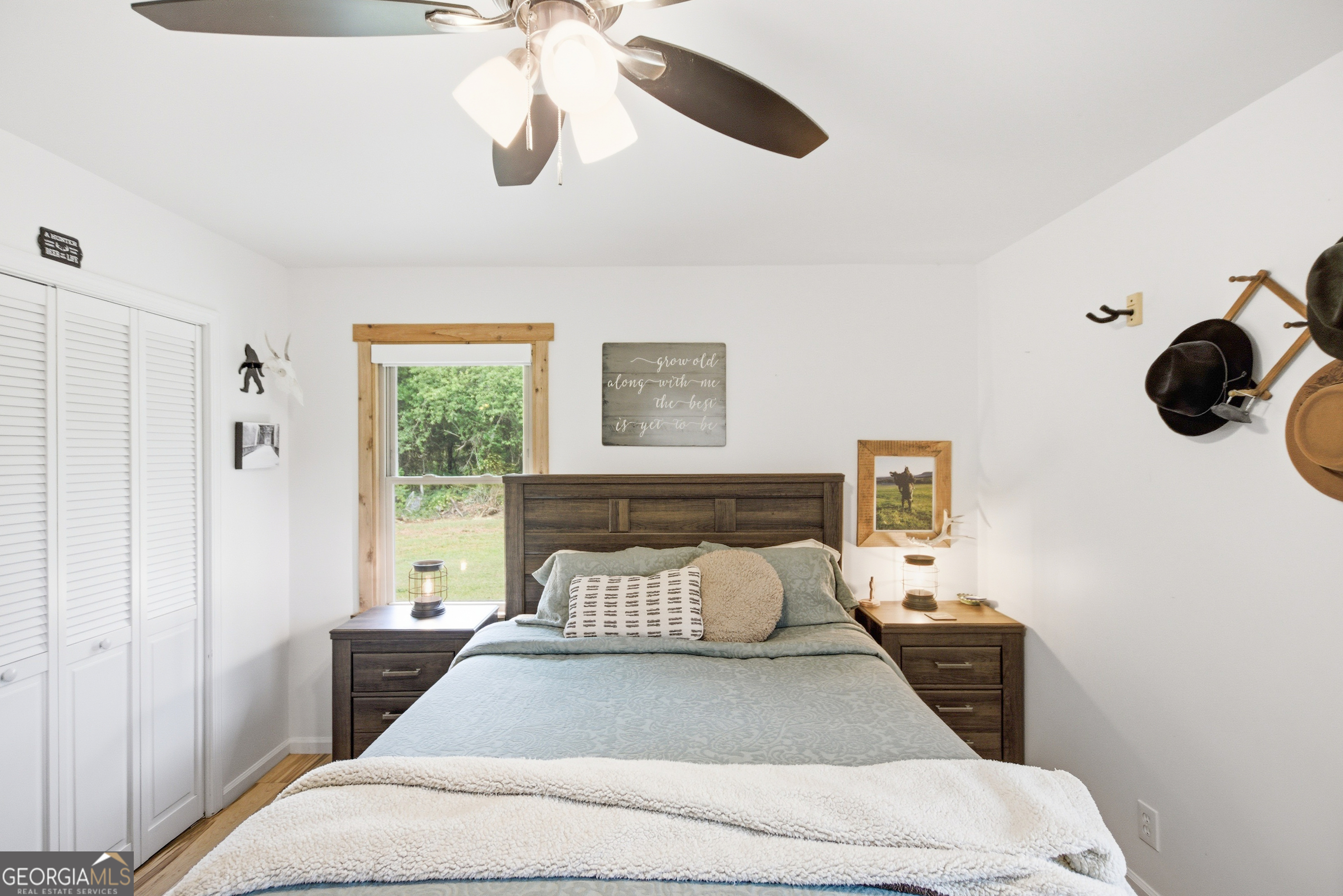 127 Akins Bridge Road Eastanollee, GA 30538 - Photo 47 of 52 a bedroom with a large bed and a window