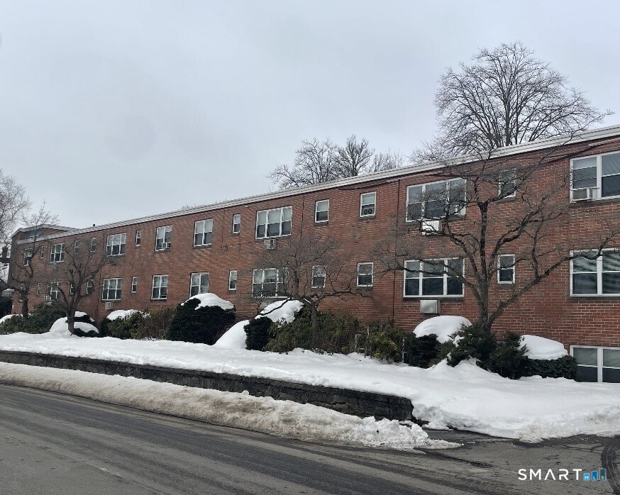 270 High Street, Unit B 2 Torrington, CT 06790 - Photo 1 of 1 a view of a house with a yard