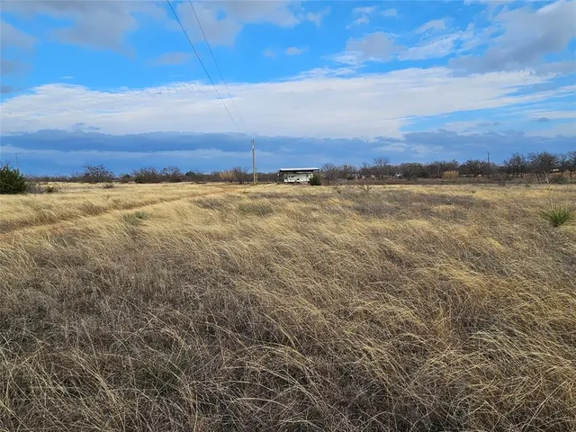 a view of an ocean and mountain