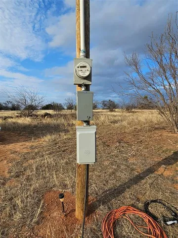 a view of a yard with an ocean view