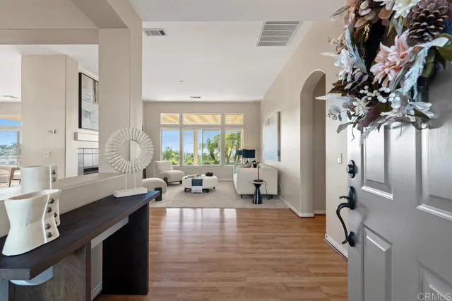 a kitchen with sink and refrigerator