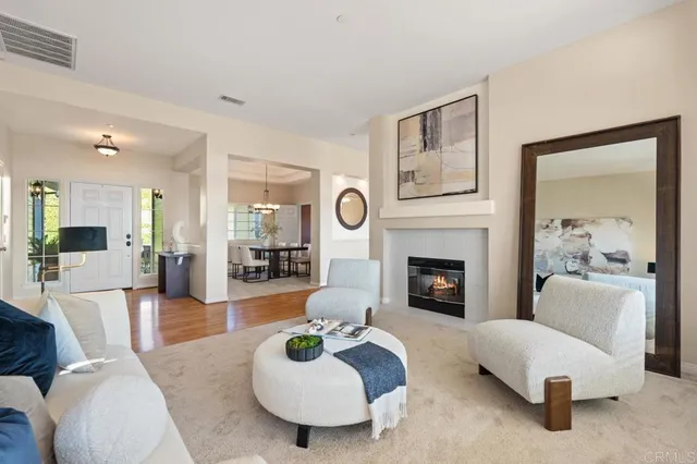 a spacious bedroom with a bed and ceiling fan