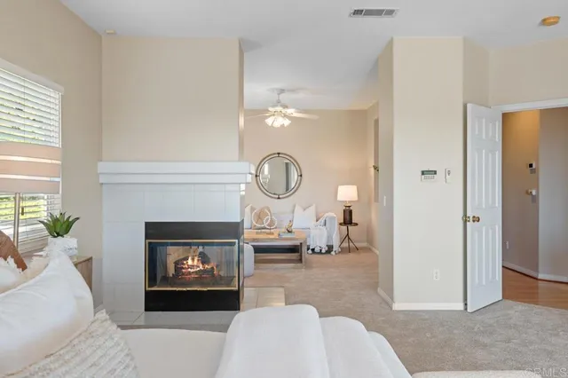 a view of swimming pool with a patio