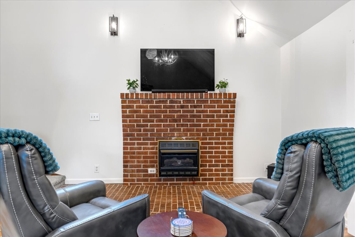 802 Evans Road Winchester, TN 37398 - Photo 15 of 43 a living room with furniture and a flat screen tv