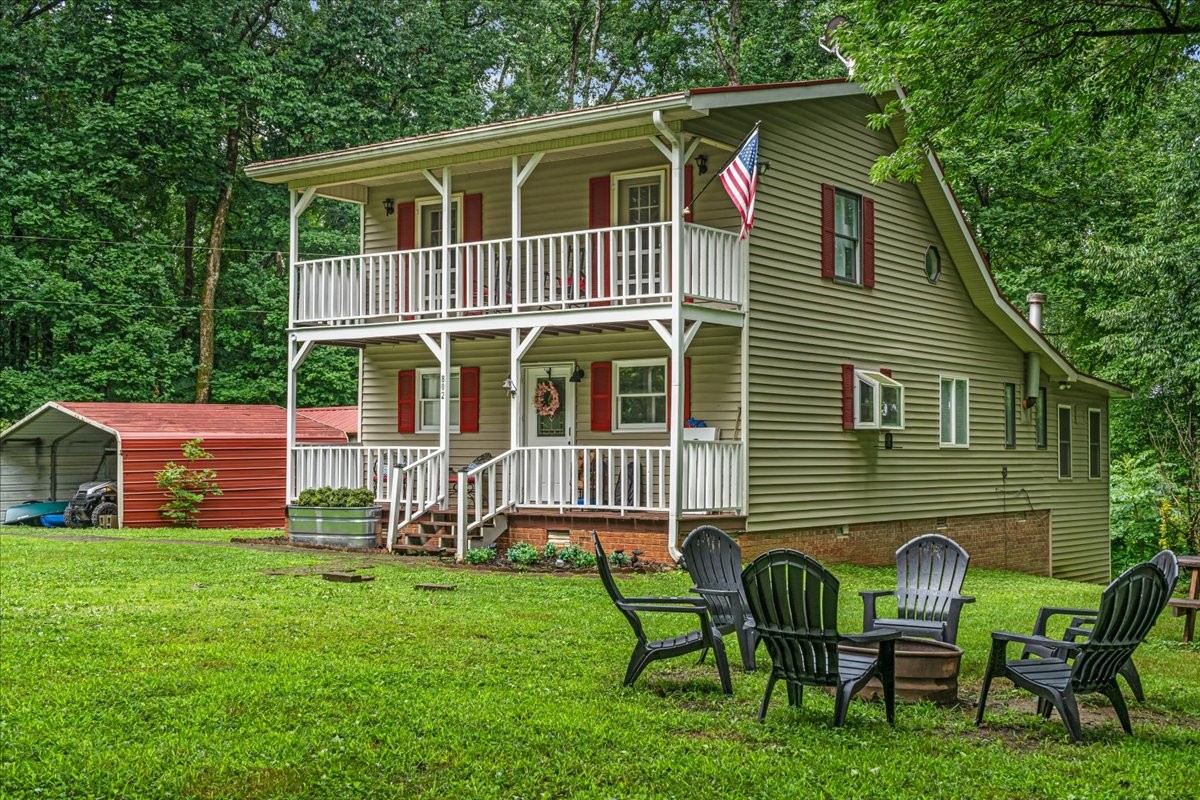 802 Evans Road Winchester, TN 37398 - Photo 2 of 43 a backyard of a house with table and chairs