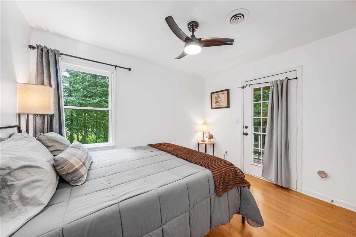 802 Evans Road Winchester, TN 37398 - Photo 27 of 43 a bedroom with a large bed and a large window