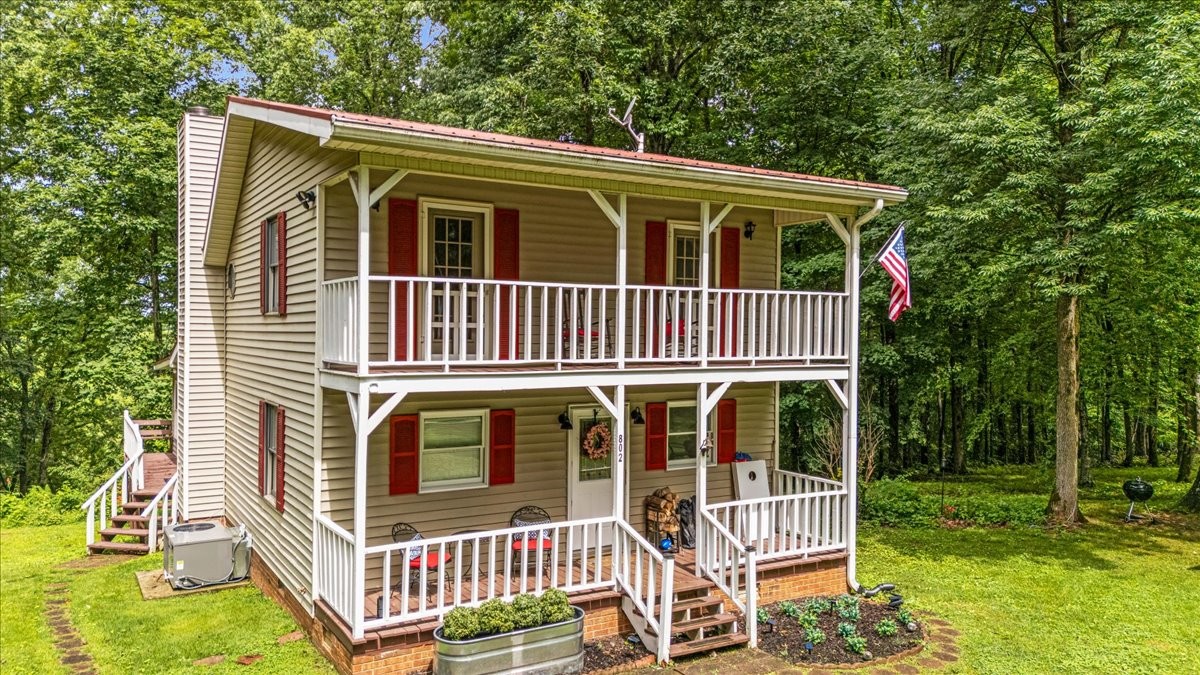 802 Evans Road Winchester, TN 37398 - Photo 32 of 43 a front view of a house with a yard