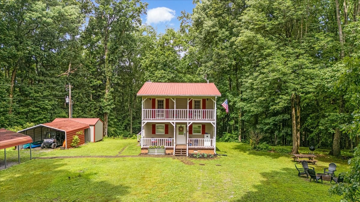802 Evans Road Winchester, TN 37398 - Photo 33 of 43 a house view with a garden space