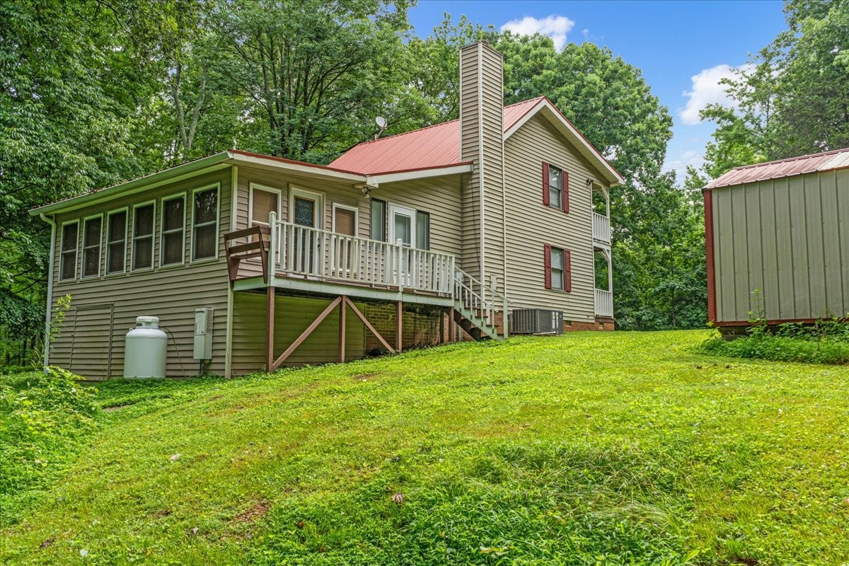 802 Evans Road Winchester, TN 37398 - Photo 41 of 43 a view of a house with a yard