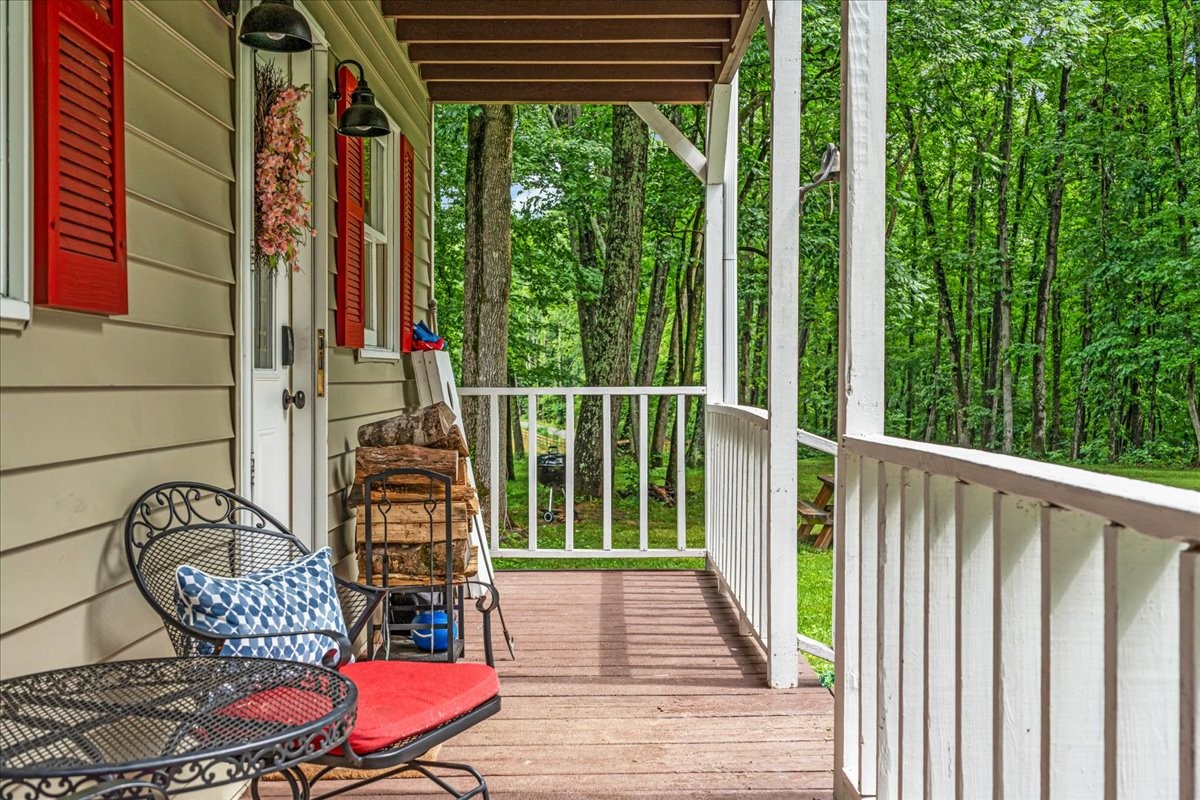 802 Evans Road Winchester, TN 37398 - Photo 43 of 43 a balcony with chairs and wooden floor