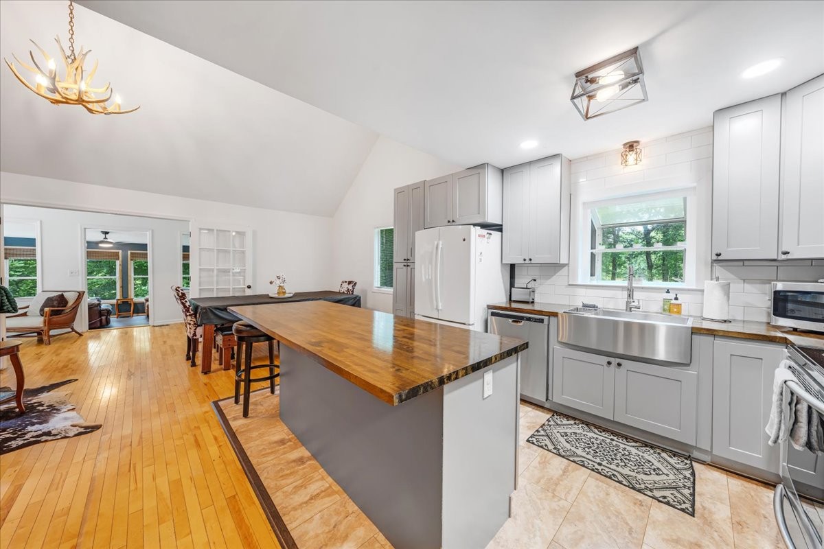 802 Evans Road Winchester, TN 37398 - Photo 7 of 43 a kitchen with stainless steel appliances granite countertop sink stove top oven and refrigerator