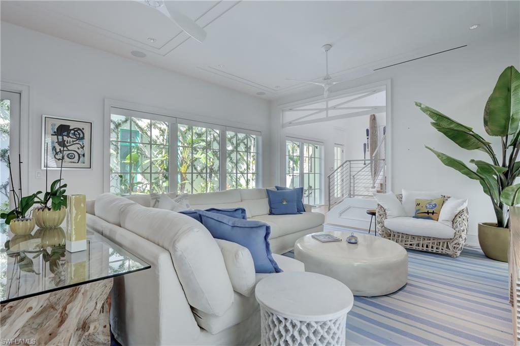942 9th Avenue South Naples, FL 34102 - Photo 17 of 29 a living room with furniture and a large window