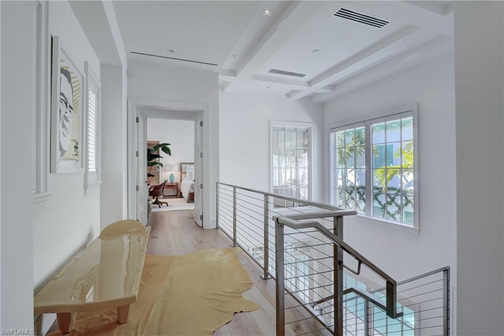 942 9th Avenue South Naples, FL 34102 - Photo 24 of 29 a view of a hallway with furniture and a window