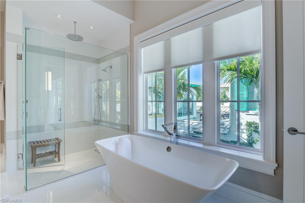942 9th Avenue South Naples, FL 34102 - Photo 29 of 29 a spacious bathroom with a tub and shower