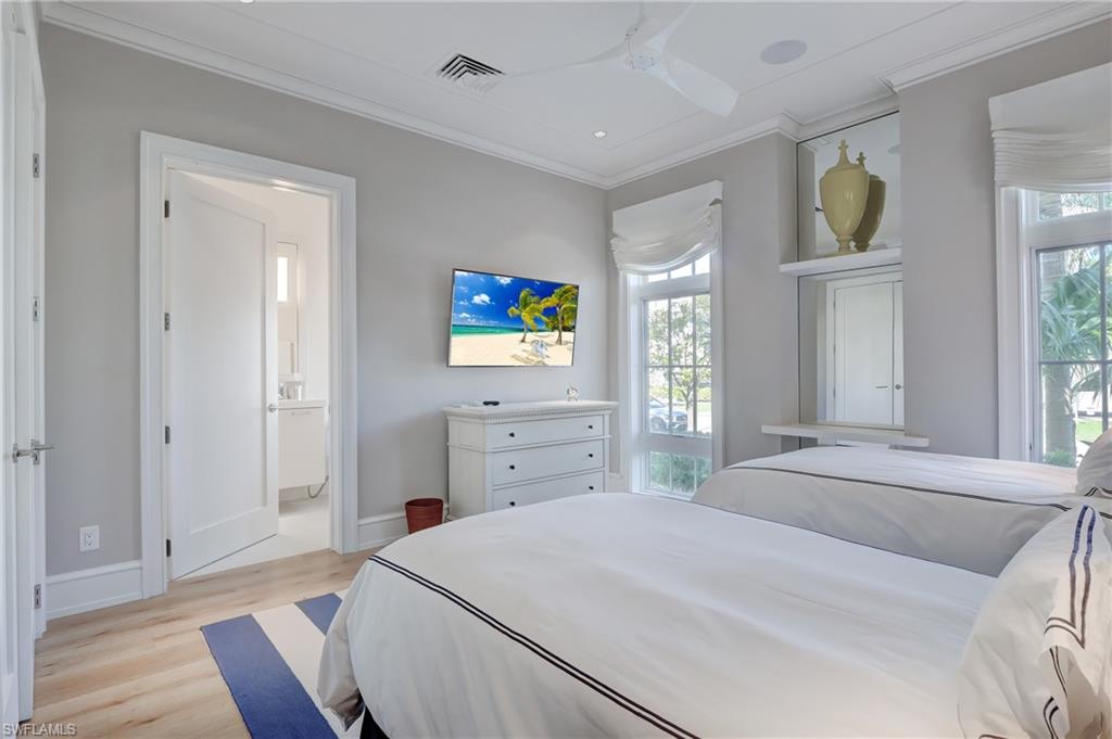 942 9th Avenue South Naples, FL 34102 - Photo 8 of 29 a bedroom with a bed and a window