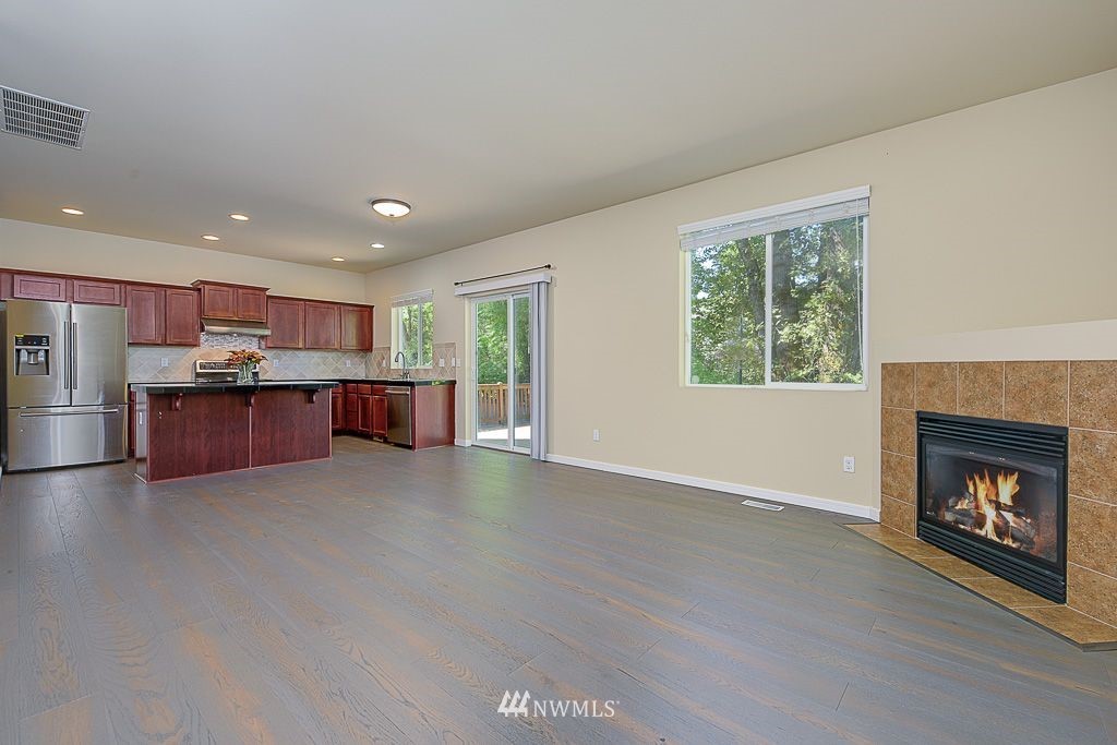 357 Field Place Northeast Renton, WA 98059 - Photo 22 of 26 a view of an empty room with a fireplace