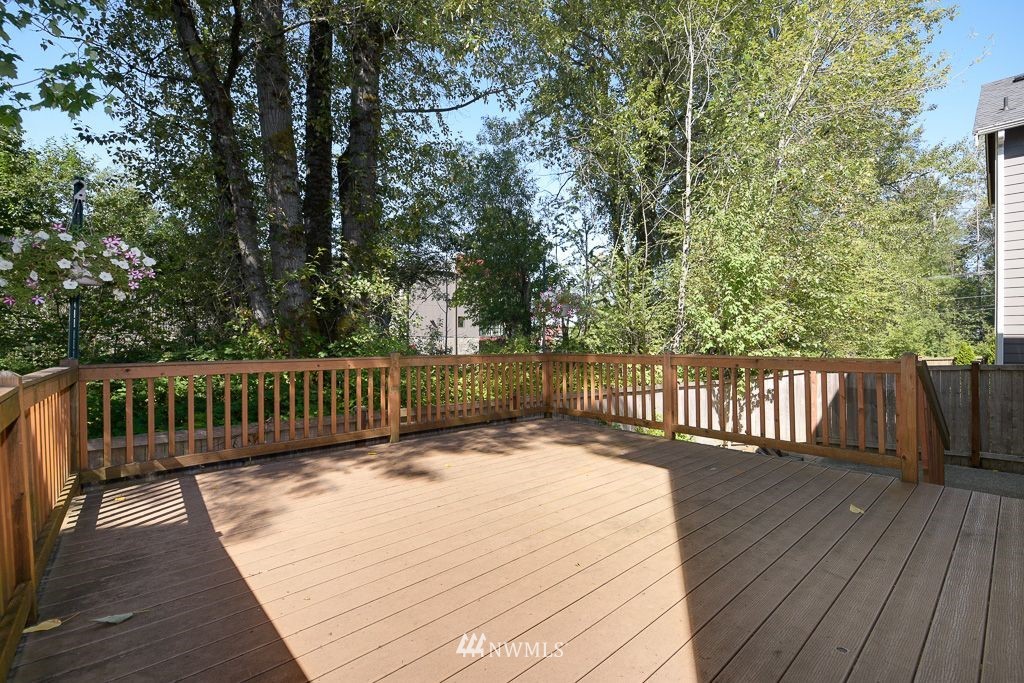 357 Field Place Northeast Renton, WA 98059 - Photo 24 of 26 a view of balcony with wooden floor