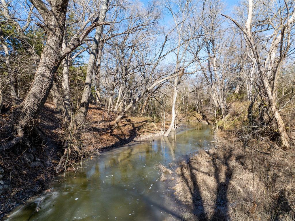 6950 County Road 995 McKinney, TX 75071 - Photo 22 of 31 a view of lake from a building