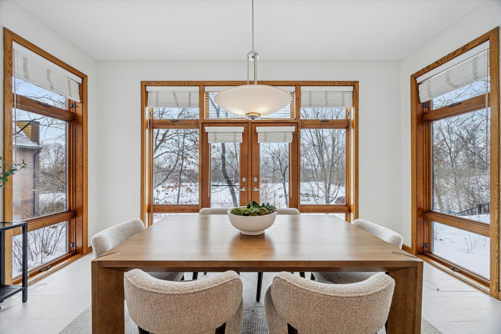 8425 Hickory Court Burr Ridge, IL 60527 - Photo 14 of 53 a kitchen with a table and chairs