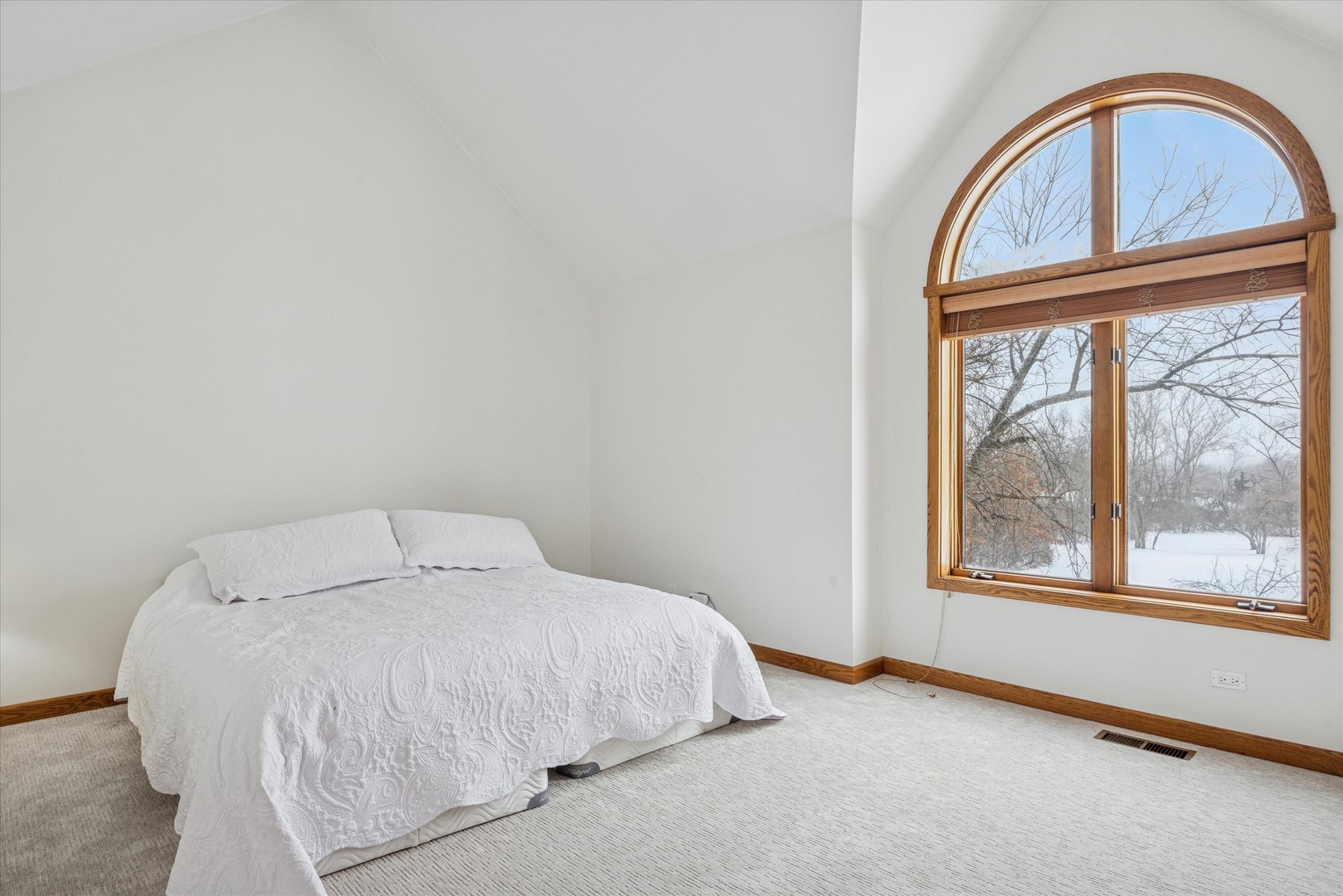 8425 Hickory Court Burr Ridge, IL 60527 - Photo 21 of 53 a bedroom with a bed and a window