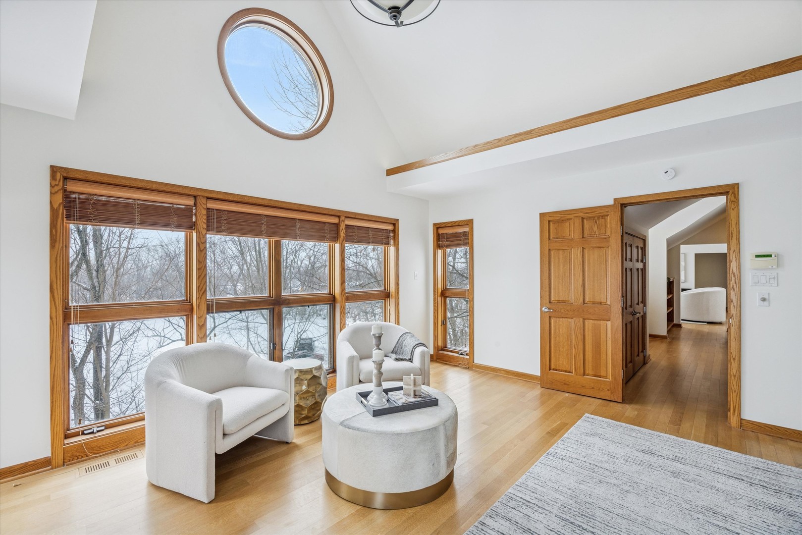 8425 Hickory Court Burr Ridge, IL 60527 - Photo 30 of 53 a living room with furniture and a large window