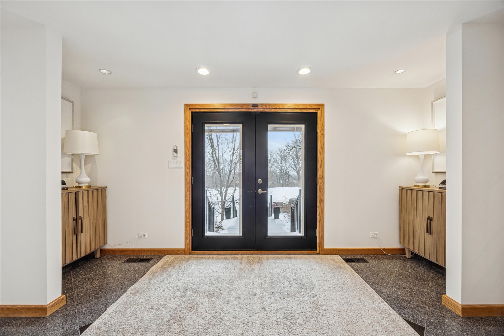 8425 Hickory Court Burr Ridge, IL 60527 - Photo 4 of 53 an empty room with windows and entrance