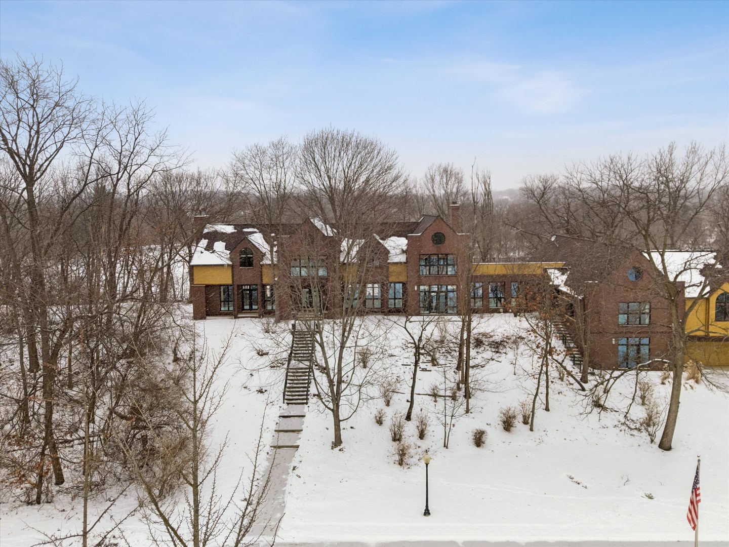 8425 Hickory Court Burr Ridge, IL 60527 - Photo 48 of 53 a view of a terrace with snow and trees in the background