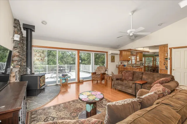 a kitchen with granite countertop stainless steel appliances and refrigerator