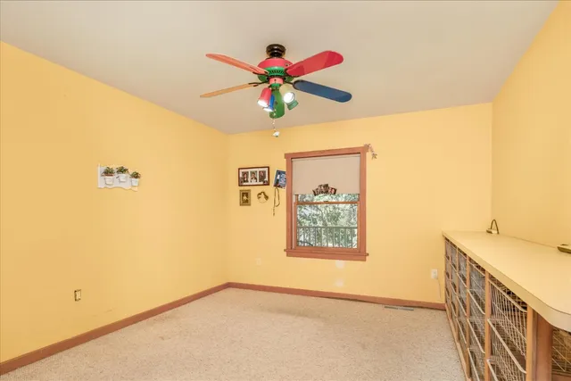 a balcony view with a seating space