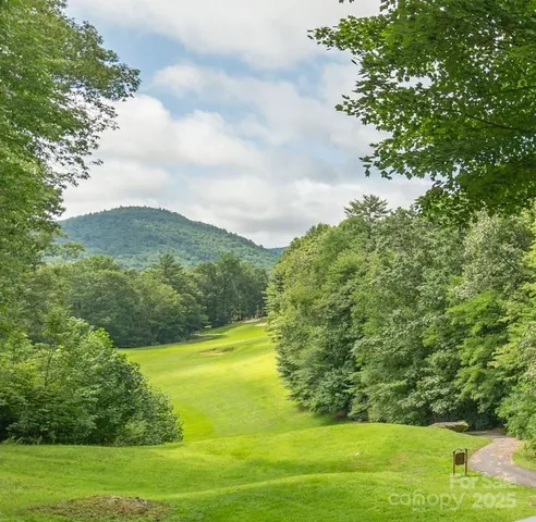 a view of a lake with a big yard