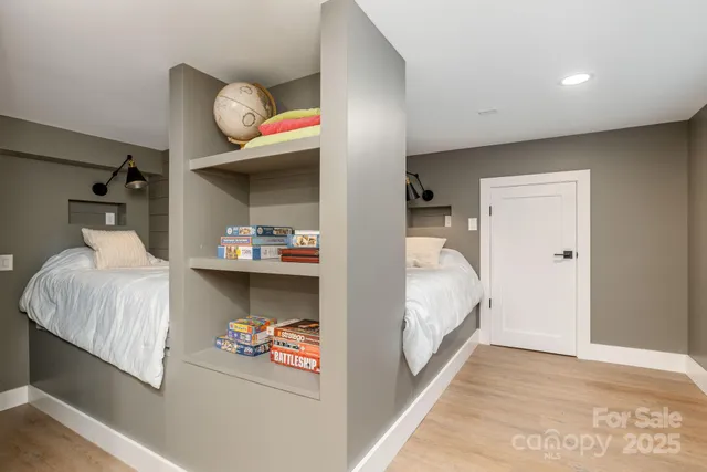 a bedroom with bed and utility