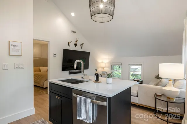 a view of living room with granite countertop furniture and fireplace