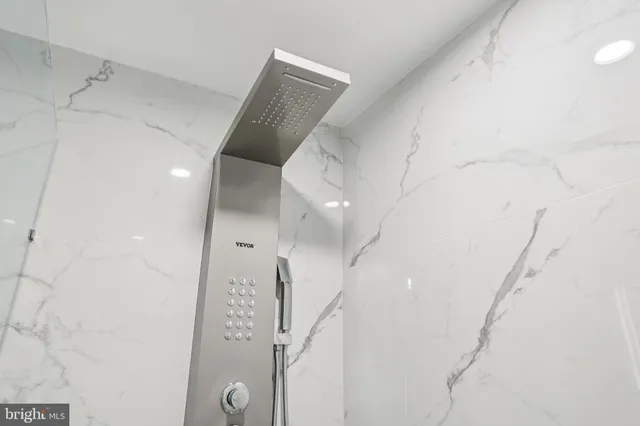 a view of a hallway with windows