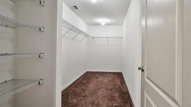 a view of a room with racks on the wall