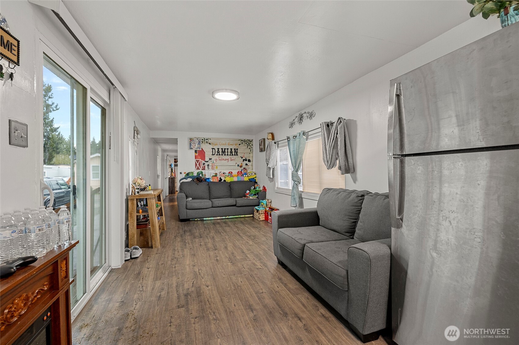20420 Lafayette Road, Unit 11 Burlington, WA 98233 - Photo 3 of 14 a living room with furniture and a wooden floor