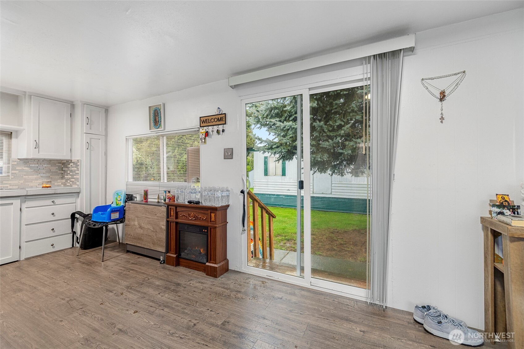 20420 Lafayette Road, Unit 11 Burlington, WA 98233 - Photo 8 of 14 a view of a livingroom with furniture hardwood floor and a window